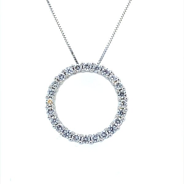 One 14 karat white gold circle pendant necklace featuring 0.54 carat of lab grown diamonds on a box chain