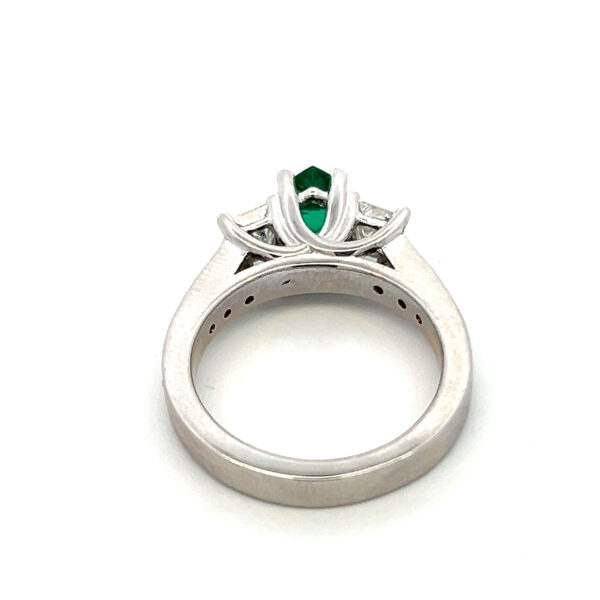 One estate 14 karat white gold ring with a heart-shaped faceted lab-created emerald and diamond accents