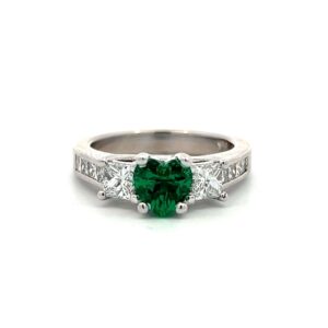 One estate 14 karat white gold ring with a heart-shaped faceted lab-created emerald and diamond accents