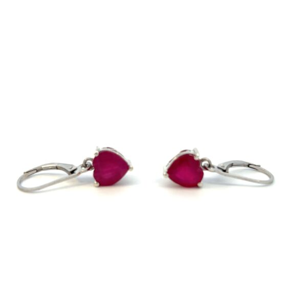 One estate pair of sterling silver drop earrings with 2 heart-shaped faceted rubies measuring 7.5mm each