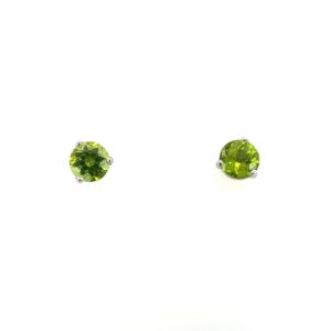 One estate pair of 14 karat white gold stud earrings with 6.5mm round-faceted peridots in three-prong settings
