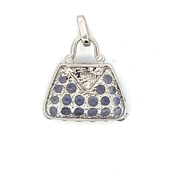 One estate 10 karat white gold purse charm pendant with a cluster 18 round faceted iolites and 1 round brilliant accent