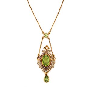 One estate antique 14 karat yellow gold drop pendant necklace with 3 peridots and 38 seed pearls