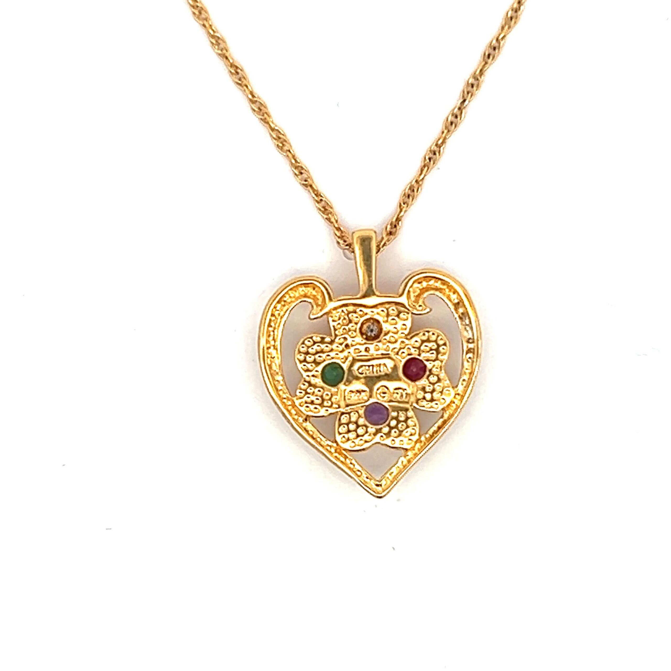 Estate vermeil pendant necklace with an ornate heart pendant set with a 3 round faceted 2.5mm gemstones including an amethyst, ruby, and emerald, and 1 round brilliant diamond weighing 0.02 carat on a 17" vermeil rope chain