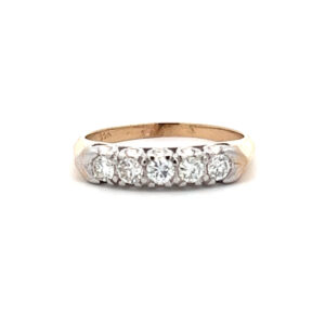 An estate vintage 14 karat two-tone gold five-stone diamond band with round brilliant diamonds weighing 0.42 carat total weight