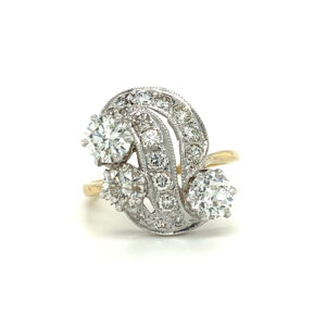 One estate vintage 14 karat two-tone cluster free-form ring with 19 round brilliant diamonds