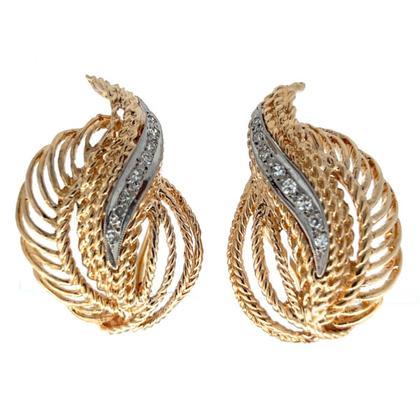 One pair of estate vintage 14 karat two-tone diamond feather earrings with 16 diamonds weighing 0.20 carat total weight