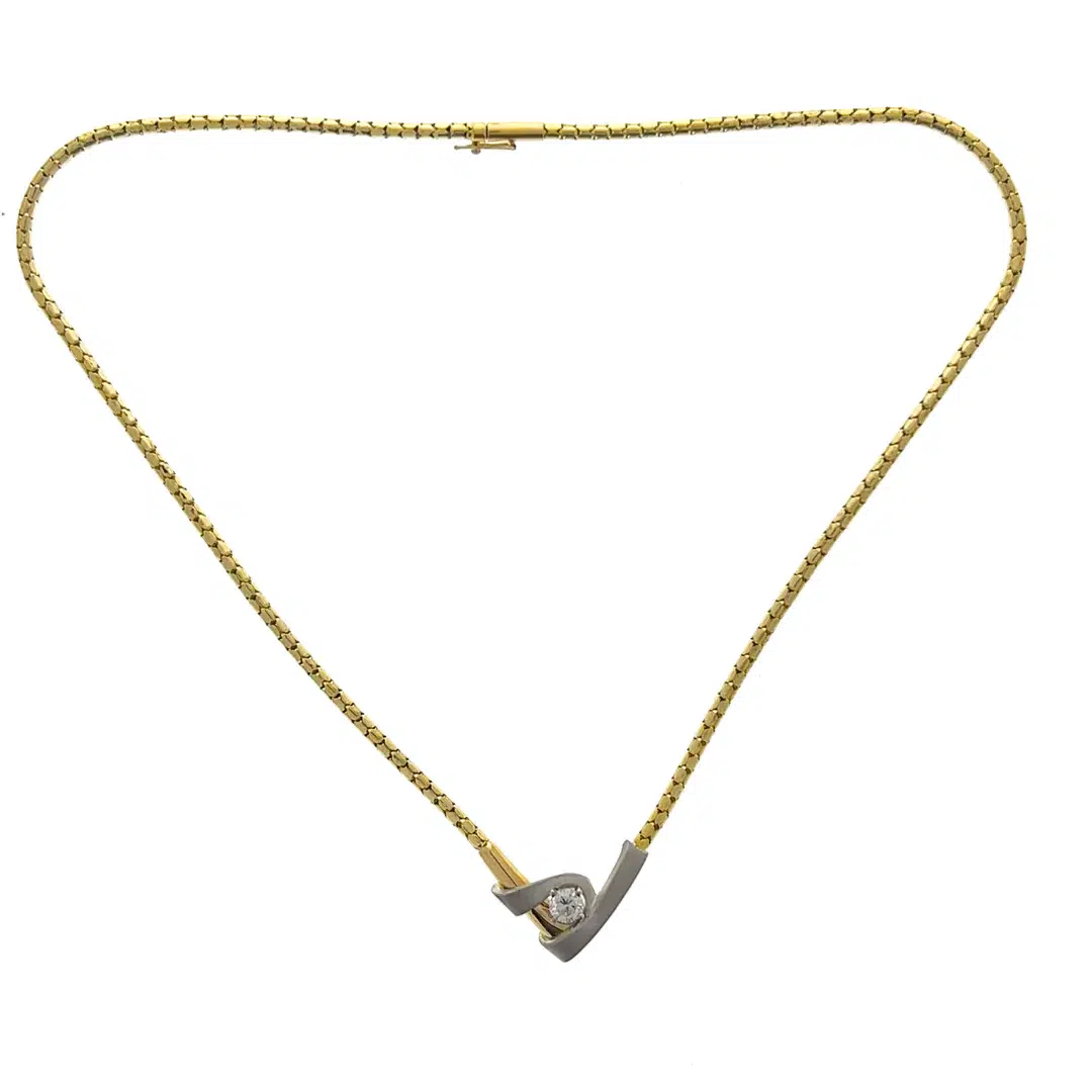 One estate 14 karat yellow gold choker design necklace with a solitaire 1/2 carat round diamond and white gold accents