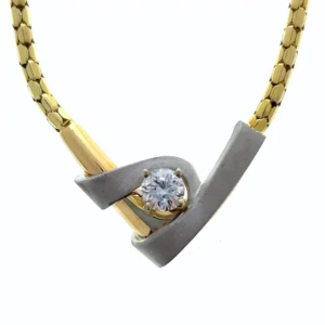 One estate 14 karat yellow gold choker design necklace with a solitaire 1/2 carat round diamond and white gold accents