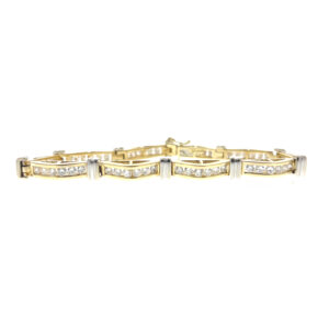 One estate 14 karat two-tone gold wave-design bracelet set with 59 round brilliant diamond weighing 3.09 carats total weight