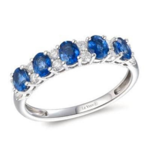 One 14 karat white gold fashion band with 5 oval blue sapphires weighing 0.95 carat total weight alternating with 12 round brilliant diamonds weighing 0.30 carat total weight