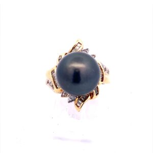 One estate 18 karat yellow gold ring with a center black Tahitian pearl and a fancy diamond halo