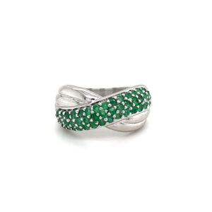 One estate sterling silver crossover ring with 43 round-faceted emeralds in pave settings