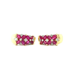 A pair of 14 karat yellow gold half hoop earrings set with 16 marquise pink sapphires resembling flower designs with diamond accents