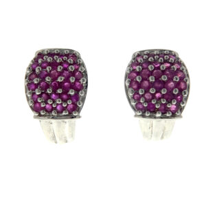 A pair of estate sterling silver half huggie hoop earrings set with clusters of 2mm round pink sapphires