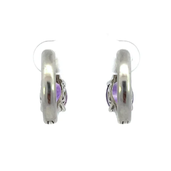 One estate pair of sterling silver polished hinged hoop earrings each set with a 9x7mm oval faceted amethyst