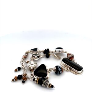 One estate sterling silver anklet with black onyx gemstones and copper accents