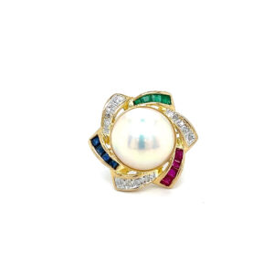 An estate 14 karat yellow gold fashion ring with a center mobe pearl and a spiral star-inspired halo set with emeralds, rubies, blue sapphires, and diamonds