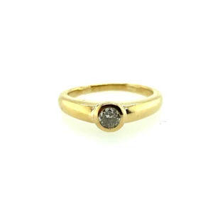 One estate 18 karat yellow gold solitaire engagement ring with a bezel-set round brilliant diamond weighing 0.25 carat