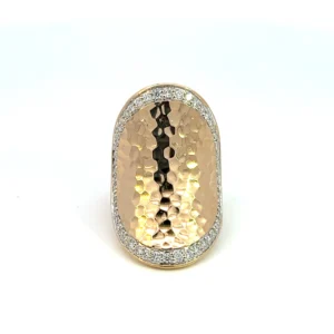 estate 18 karat yellow and white gold large oval concave hammered design ring resembling a saddle shape set with 54 round brilliant diamonds weighing 0.30 total carat weight in white gold on the outside of the ring. The ring has a mural like engraved design on the back. It is designed by John Hardy