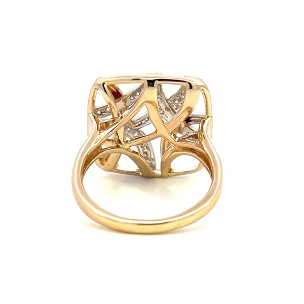 One estate 14 karat yellow gold open cushion shaped ring with overlapping wire designs set with 29 round brillant diamonds weighing 0.33 total carat weight. Four wire strands are set with diamonds while 2 are polished.