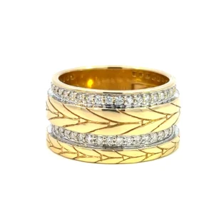 estate 18 karat yellow and white gold 11mm wide band set with engraved leaf designs in yellow gold and 50 round brilliant diamonds weighing 0.50 total carat weight in inset white gold in two offset strand on the band.
