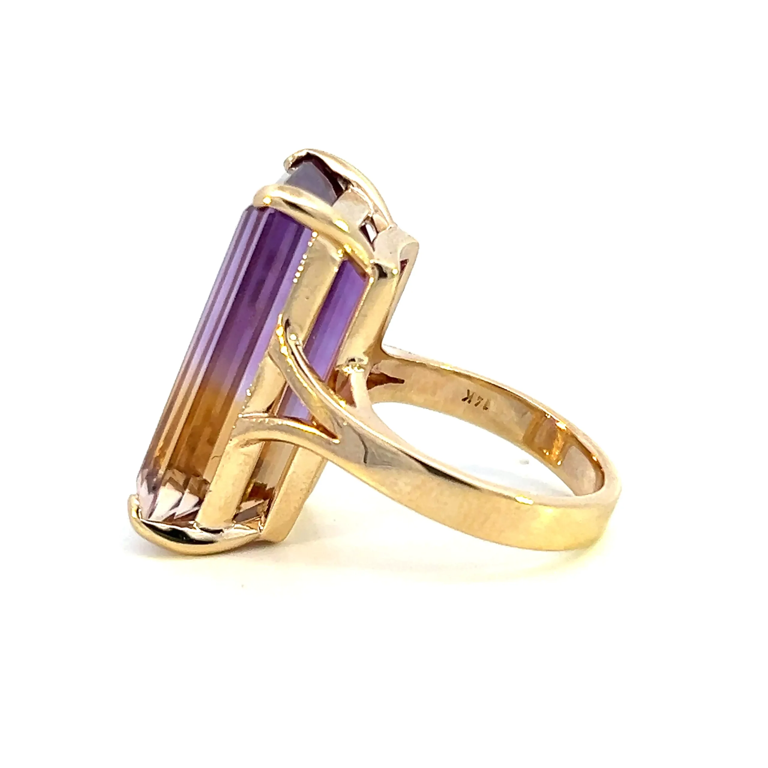 One estate 14 karat yellow gold solitaire gemstone ring with an emerald-cut ametrine weighing 18.93 carats in a four-prong setting