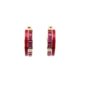 One pair of 14 karat yellow gold hoop earrings with seamless rows. One row is a merlot red enamel. The other row is set with princess-cut rhodolite garnets weighing 3.24 carats total weight and a small section near the bottom of the hoop set with diamonds weighing 0.04 carat total weight.