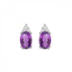 A pair of 10 karat white gold stud earrings each set with an oval faceted amethyst with a cluster of 3 round brilliant diamonds at the top of each amethyst
