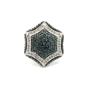 On estate hexagon blue diamond ring crafted from sterling silver containing a center cluster of round brilliant-cut irradiated blue diamonds in a hexagon design with a hexagonal halo of round brilliant white diamonds and sterling silver pave accents in the shoulders and band.