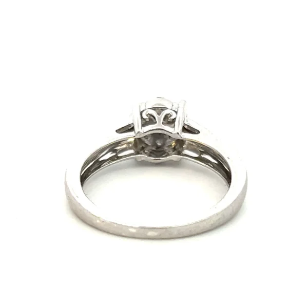 Estate sterling silver diamond cluster disc ring with 9 round brilliant-cut diamonds in bead settings.