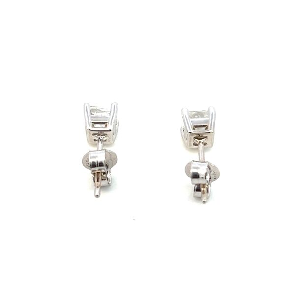 One estate pair of 14 karat white gold diamond stud earrings containing 2 princess-cut diamonds weighing 0.75 carat total weight.