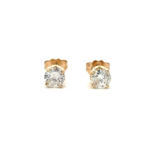 One 14 karat yellow gold pair of estate round diamond stud earrings containing 2 round brilliant diamonds weighing 0.40 carat total weight in four-prong settings.