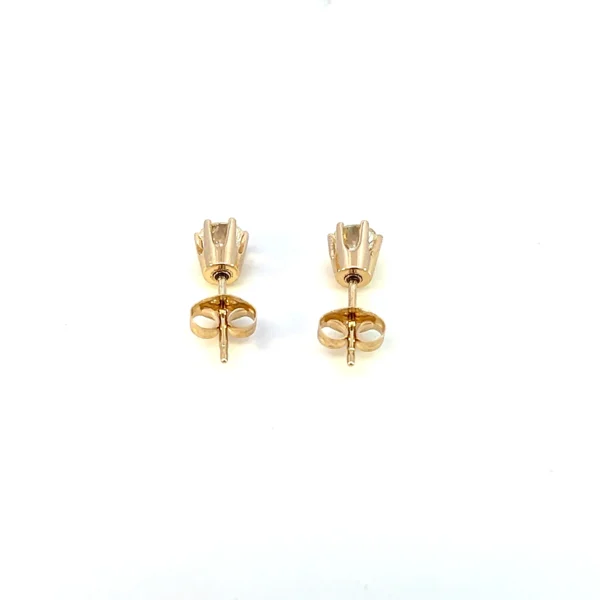 One pair of estate vintage diamond stud earrings crafted from yellow gold featuring 2 round brilliant-cut diamonds weighing 0.50 carat total weight in six-prong settings