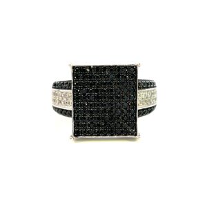 One estate black and white fashion crafted from sterling silver containing a square top set with 90 round black spinel in pave settings. The band features 2 outer rows of round black spinel and 2 inner rows of white cubic zirconia.