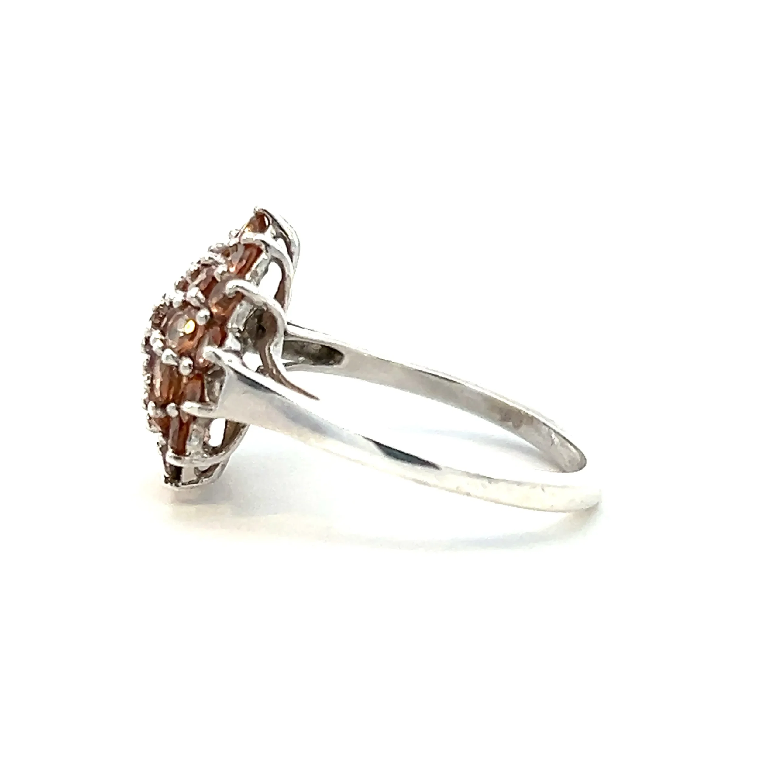 One Estate Bronze Citrine Ring crafted from sterling silver featuring 33 round bronze citrines measuring 2.5mm each in pave settings in a round multi-halo cluster floral motif.