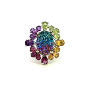Estate sterling silver ring with a dyed quartz geode in peacock blue and purplish magenta, accented by pear-shaped garnet, citrine, amber, and peridot gemstones.