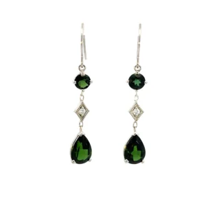 One pair of estate 14 karat white gold drop earrings. Each earrings contains a 5mm round green tourmaline that drops to a milgrain-accented diamond-shaped setting with a round brilliant diamonds that drops to a 9x7mm pear-shaped green tourmaline.