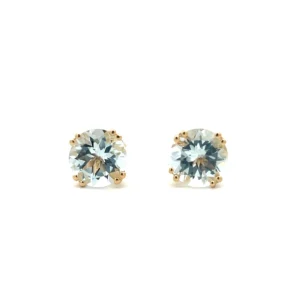 One estate pair of 14 karat yellow gold stud earrings containing round-faceted aquamarines weighing 3.25 carats total weight in double four-prong basket settings with friction posts and backs