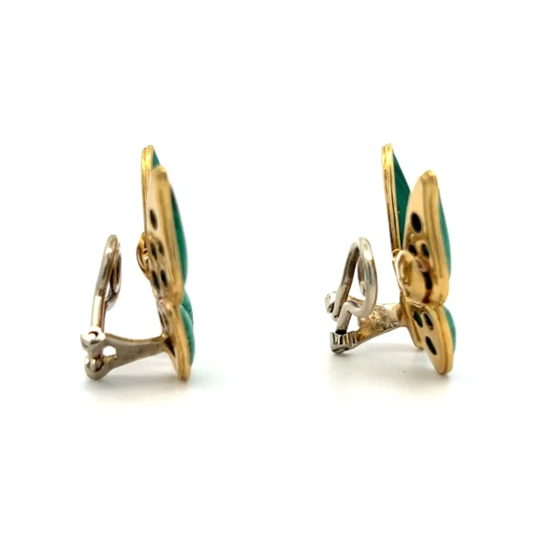 One estate pair of 18 karat yellow gold malachite butterfly earrings with clip-on closures.