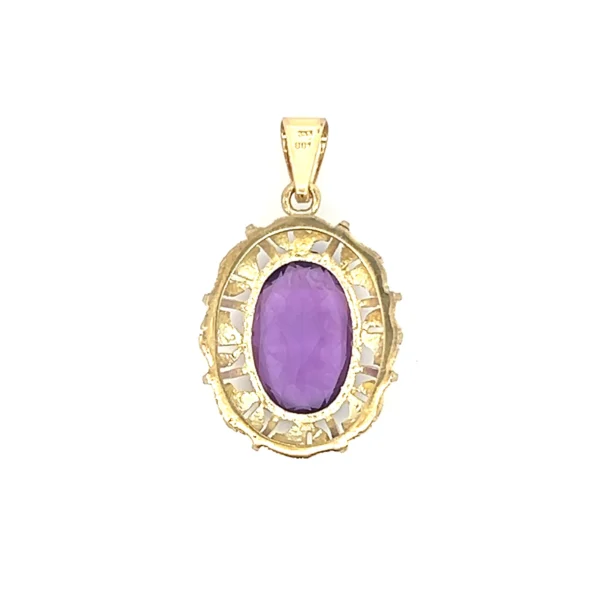 One 8 karat yellow gold amethyst pendant from the 1960s containing one oval faceted amethyst measuring 16x11mm in an open-work gold frame. The entire pendant including the bail measures 33x18.54mm.