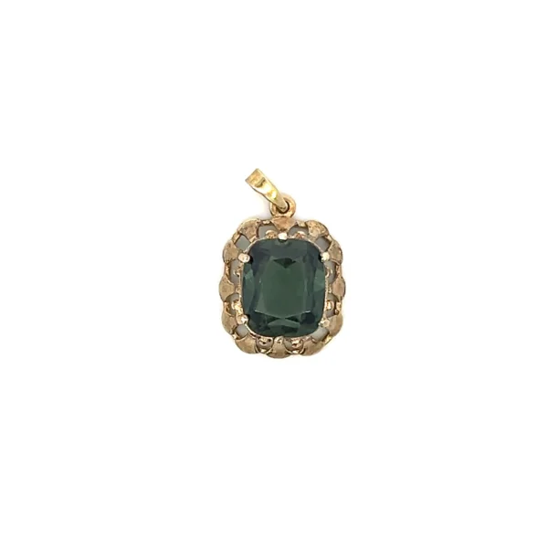 One estate 8 karat yellow gold synthetic green spinel pendant containing a cushion-cut synthetic green spinel weighing 5.64 carats in a bezel setting with an open-work gold frame. Stamped "333" with a total weight of 2.79 grams.