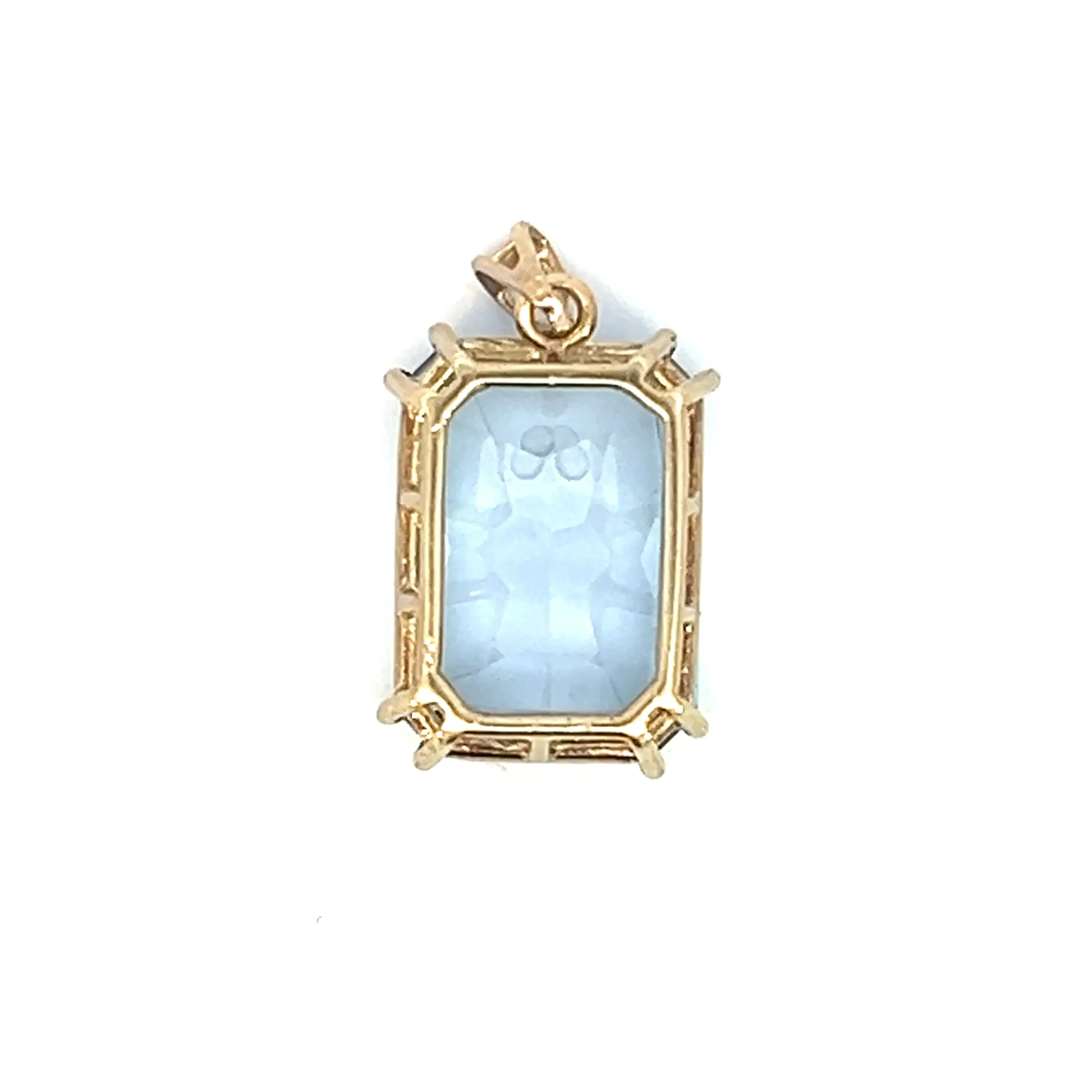 One antique estate 8 karat yellow gold pendant featuring an emerald-cut synthetic blue spinel measuring 13x18mm and weighing 16.30 carats in a double four-prong setting. The entire pendant measures 27x22mm.