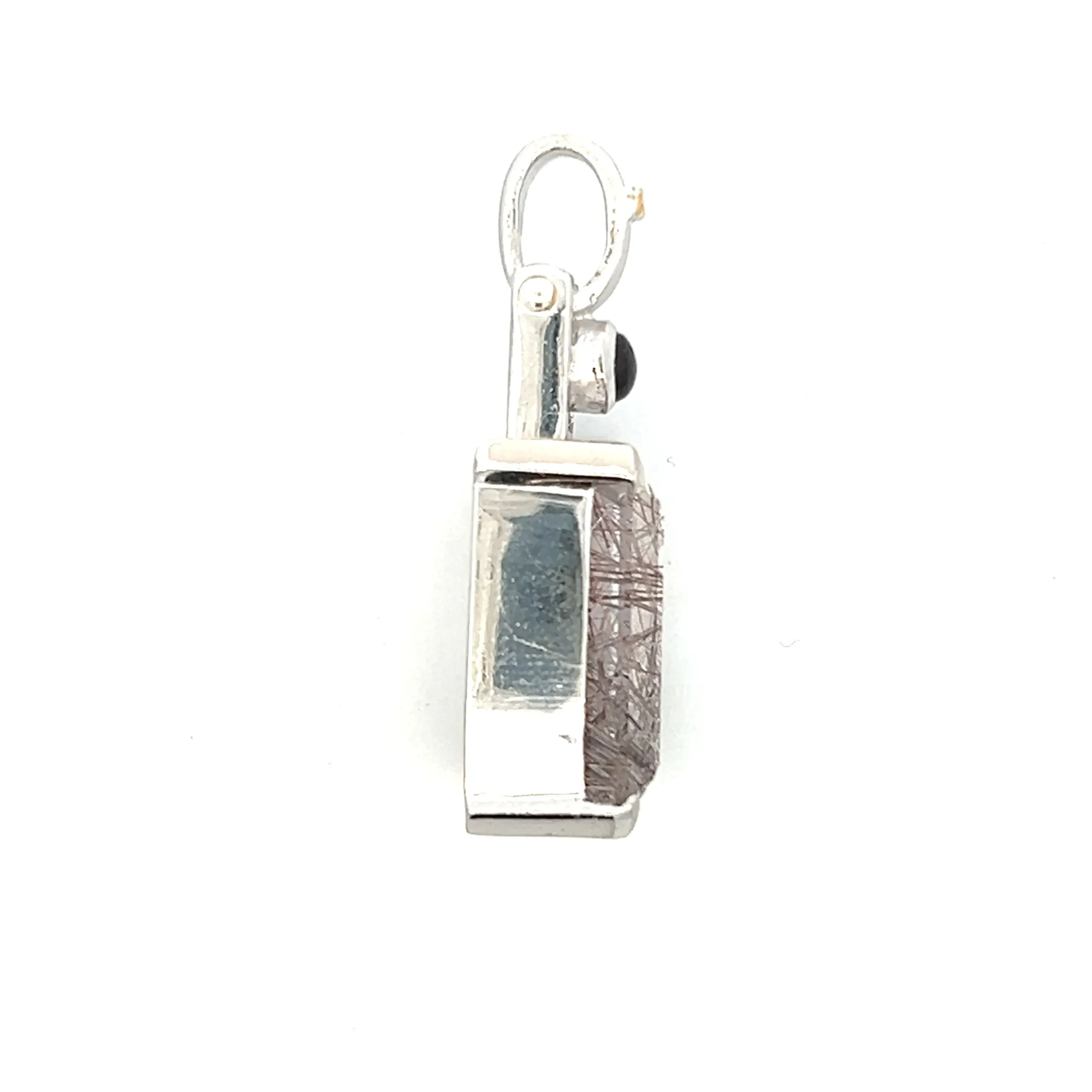 One estate sterling silver gemstone pendant containing a focal rectangle-shaped tourmalated quartz weighing 28.62 carats in a bezel setting and a small round tourmaline weighing 0.84 carat in a bezel setting above the quartz.