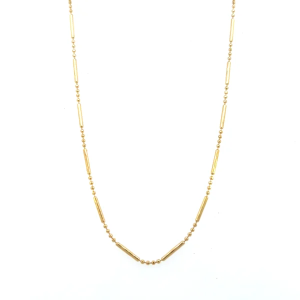 One estate 18 karat yellow gold hollow tube and beaded chain necklace measuring 24" long with a spring ring clasp.