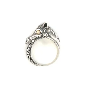 One estate sterling silver horse head ring with 18 karat yellow gold eyes and scrollwork going partway around the band. The top of the ring measures 9.8mm wide and the bottom of the band measures 4.14mm wide. Stamped 925 and 18K with a total weight of 8.78 grams. Ring size 8.