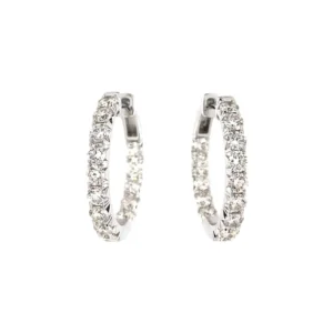 One pair of 14 karat white gold inside out diamond hoop earrings containing a total of 28 round brilliant diamonds weighing 2.00 carats total weight with I-J color and SI1 clarity.