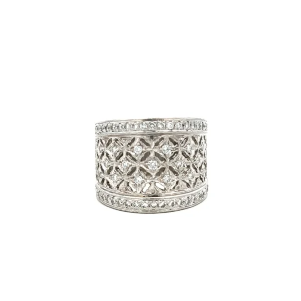 Estate platinum wide diamond lace band with 65 round brilliant-cut diamonds in an openwork lace design.