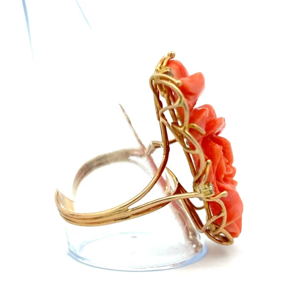 Estate Carved Rose Coral and Diamond Ring in 14K yellow gold, featuring a carved coral rose and diamond accents.