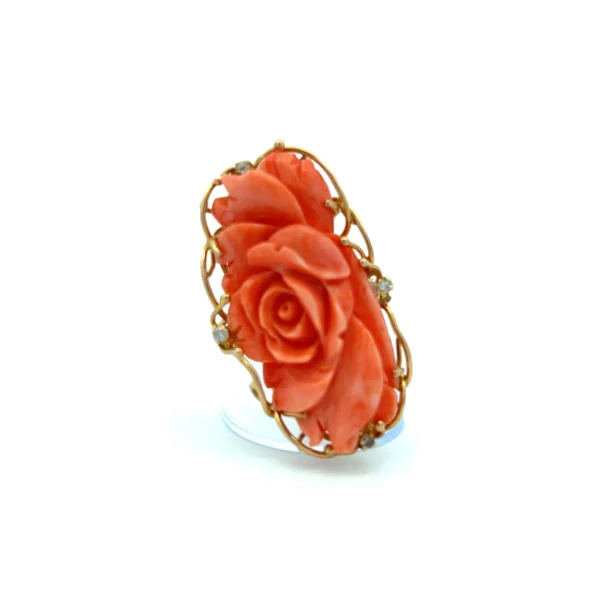 Estate Carved Rose Coral and Diamond Ring in 14K yellow gold, featuring a carved coral rose and diamond accents.